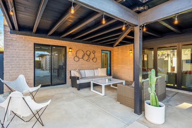 view of patio featuring outdoor lounge area and french doors