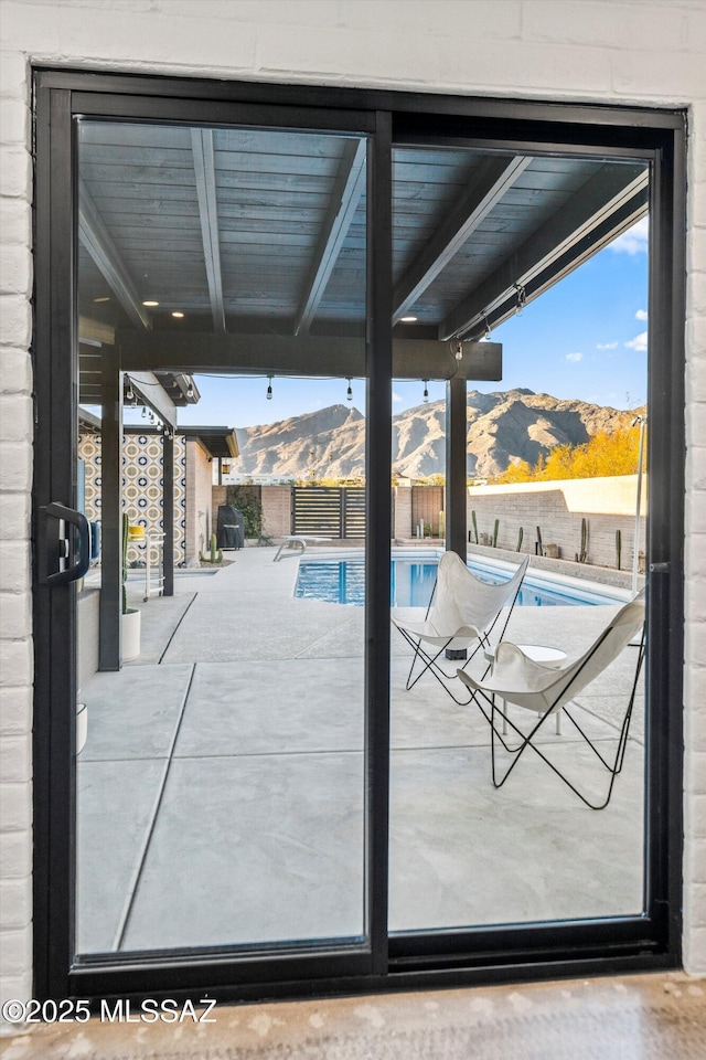 view of pool with a mountain view