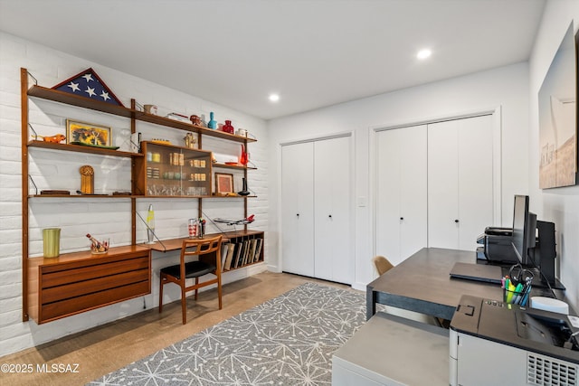 office area featuring recessed lighting and concrete floors