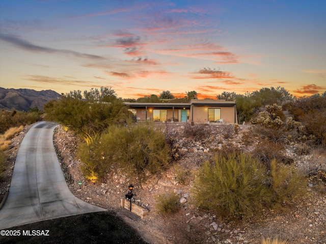 exterior space featuring a mountain view