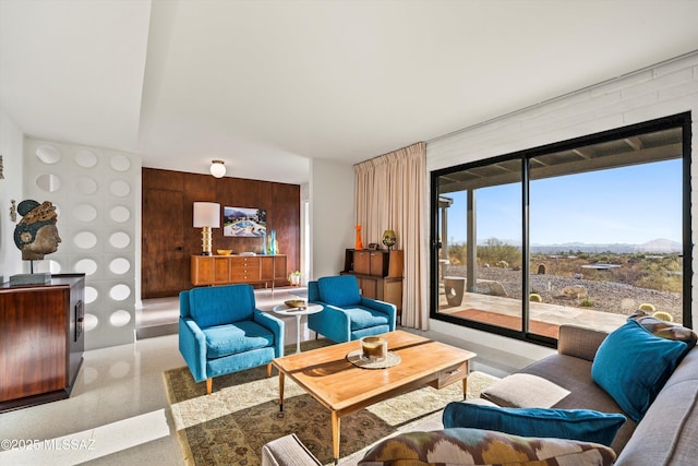 living room featuring speckled floor