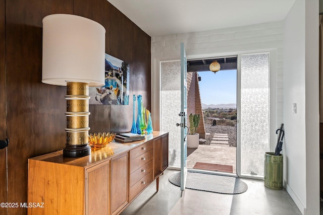 interior space featuring finished concrete flooring