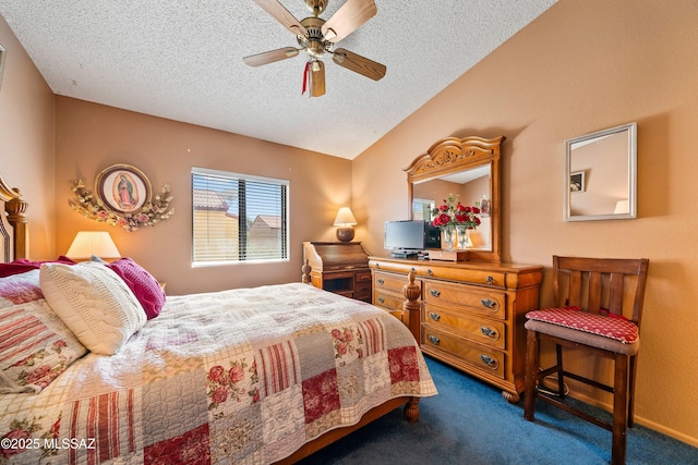 bedroom with lofted ceiling, dark colored carpet, ceiling fan, and a textured ceiling