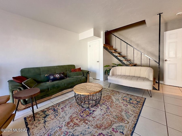 tiled living room with stairway