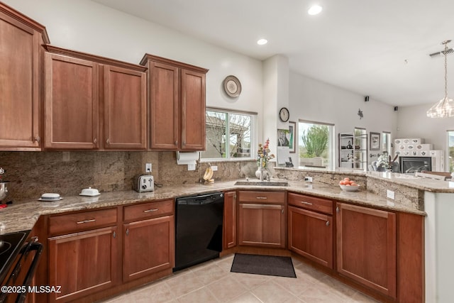 kitchen featuring dishwasher, a peninsula, visible vents, and decorative backsplash