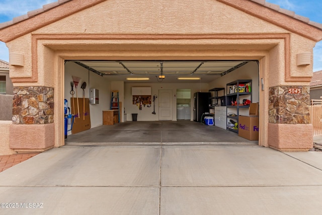 garage with driveway