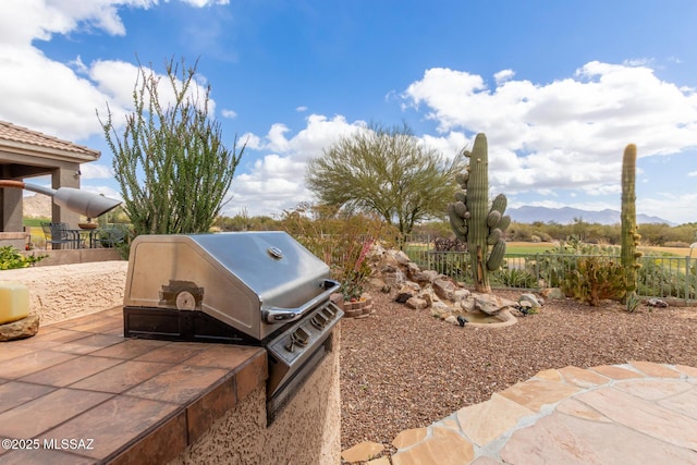 exterior space featuring a patio area and area for grilling