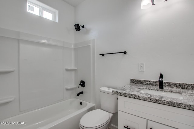 full bath featuring shower / washtub combination, vanity, and toilet