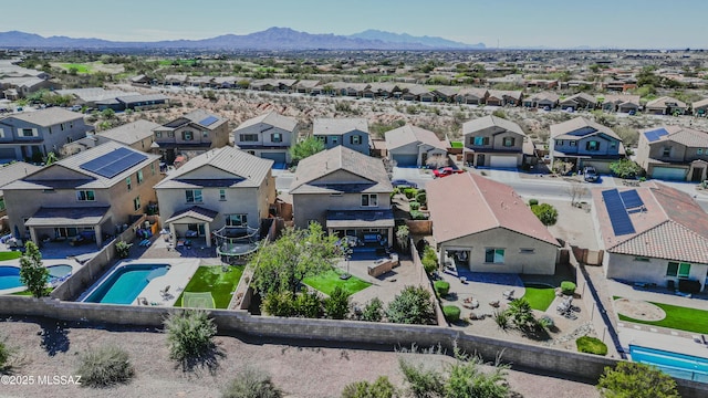 aerial view with a mountain view and a residential view