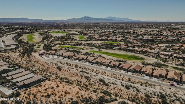 bird's eye view featuring view of golf course, a residential view, and a mountain view