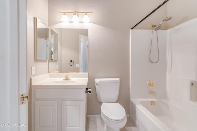 full bathroom featuring bathtub / shower combination, toilet, vanity, tile patterned flooring, and baseboards