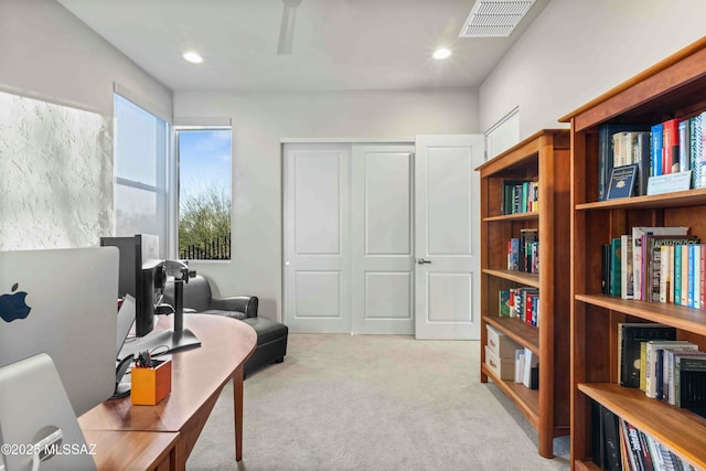 office space with carpet, visible vents, and recessed lighting