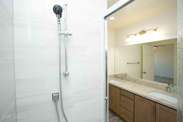 bathroom with tiled shower