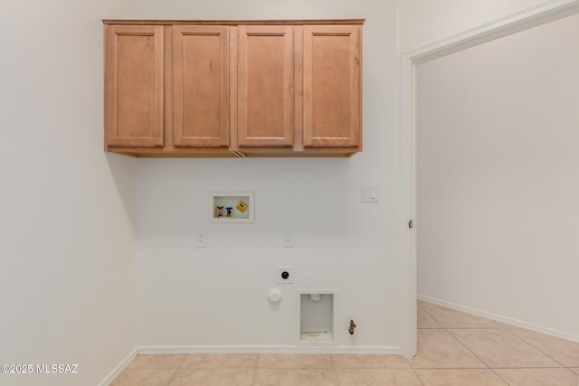 washroom featuring hookup for a washing machine, hookup for a gas dryer, baseboards, cabinet space, and electric dryer hookup