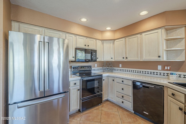 kitchen with recessed lighting, open shelves, black appliances, and light tile patterned floors