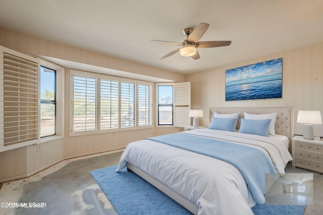 bedroom featuring concrete floors and a ceiling fan