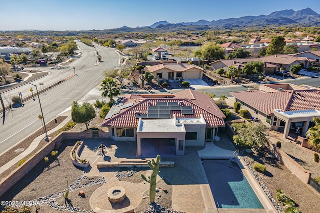 aerial view with a residential view and a mountain view