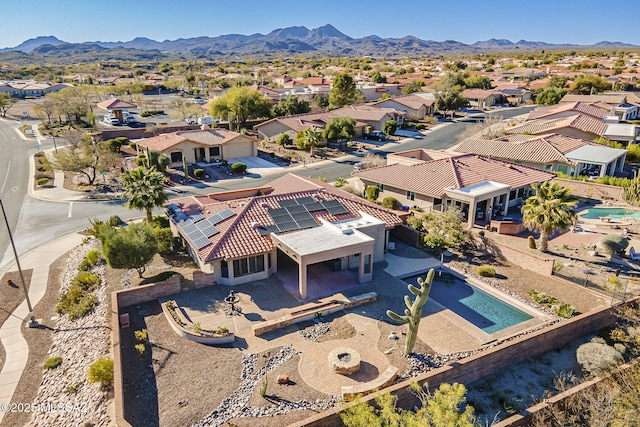 bird's eye view with a residential view and a mountain view