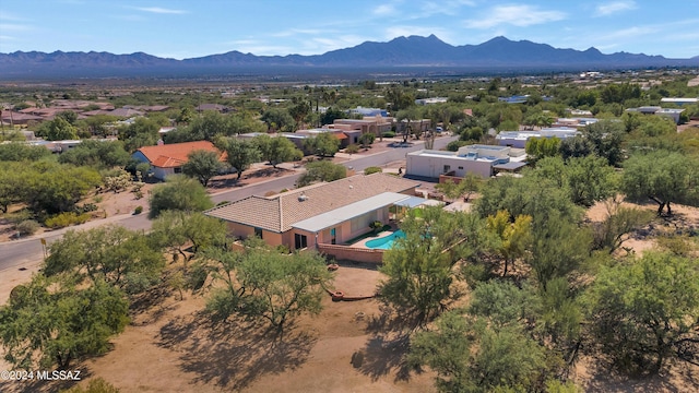 bird's eye view with a mountain view