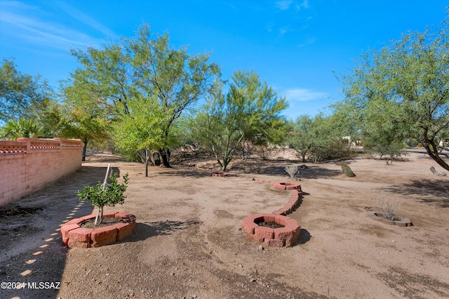 view of yard featuring fence