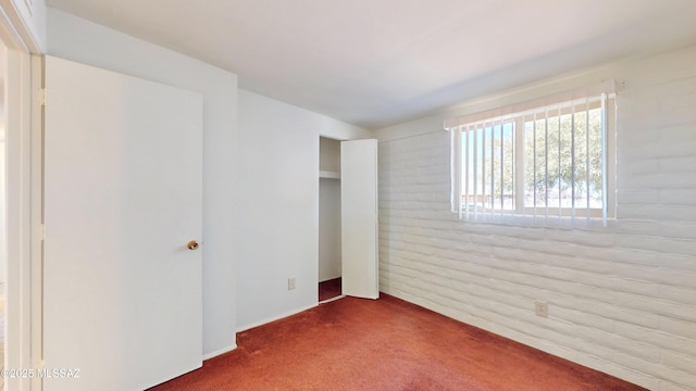 unfurnished bedroom with carpet floors