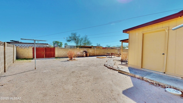 view of yard featuring a patio and a fenced backyard