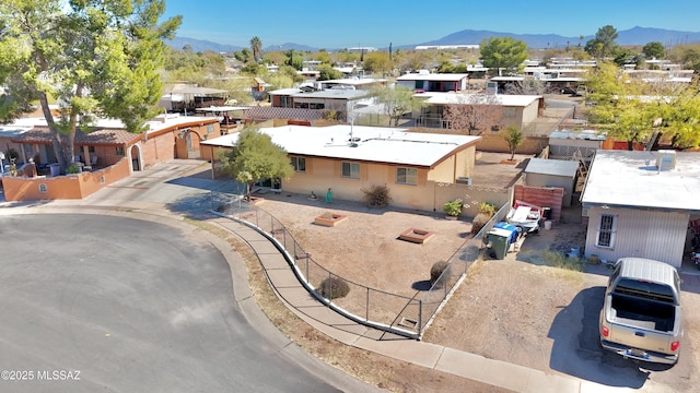 bird's eye view featuring a residential view and a mountain view