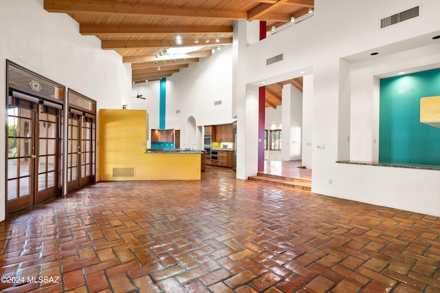 interior space with french doors and visible vents