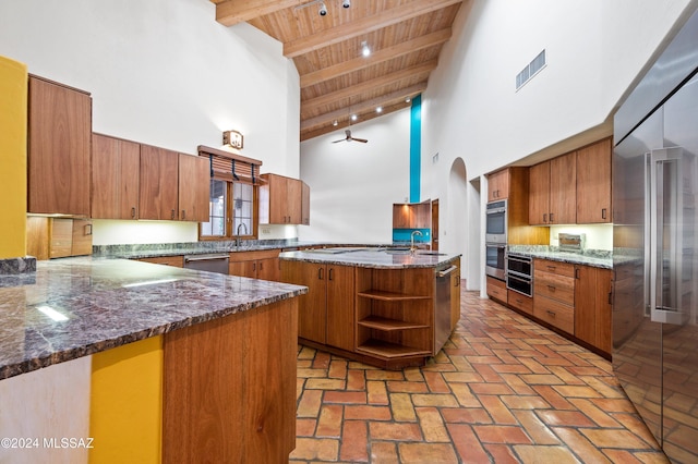 kitchen featuring brown cabinets, open shelves, stainless steel appliances, visible vents, and wood ceiling