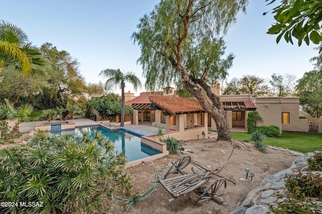 outdoor pool featuring a patio