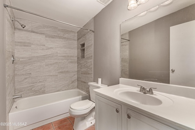 full bathroom featuring visible vents, shower / bath combination, toilet, vanity, and tile patterned flooring