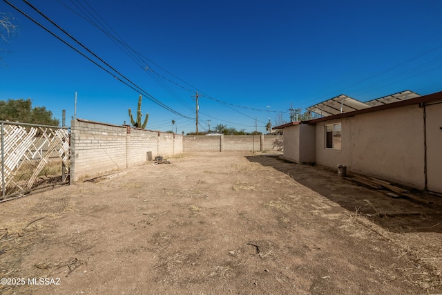 view of yard featuring fence