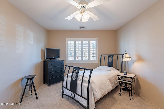 bedroom featuring visible vents, ceiling fan, light carpet, and baseboards