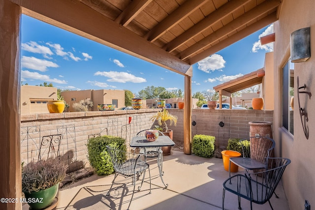 view of patio with fence