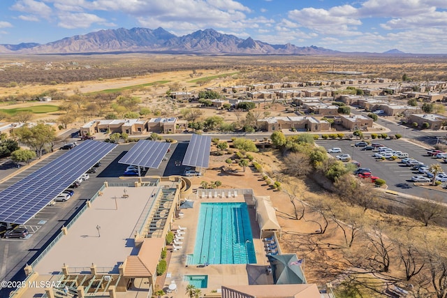 drone / aerial view featuring a mountain view