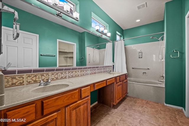 full bathroom with double vanity, a sink, visible vents, and shower / tub combo with curtain