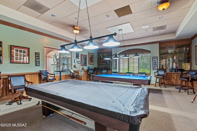 recreation room featuring a wainscoted wall, carpet floors, billiards, a tray ceiling, and crown molding