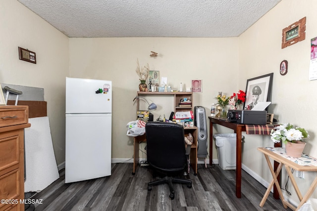 office featuring dark wood-style floors, a textured ceiling, and baseboards