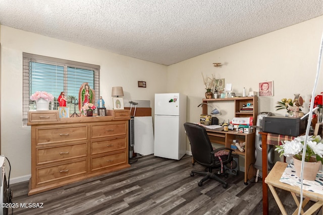 home office featuring a textured ceiling, baseboards, and dark wood-style flooring