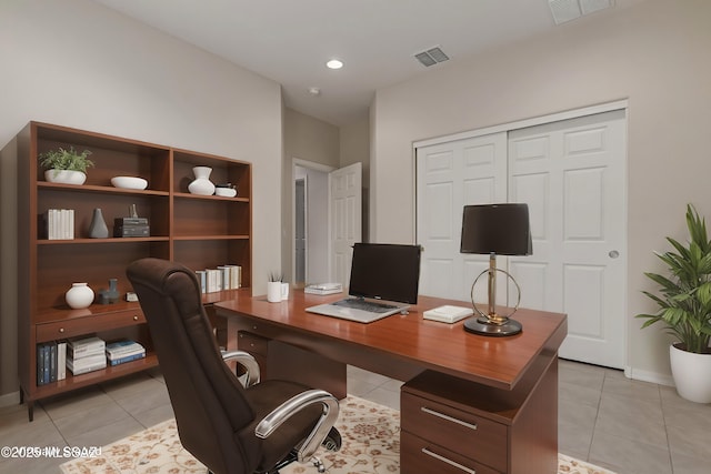 home office with visible vents and light tile patterned flooring