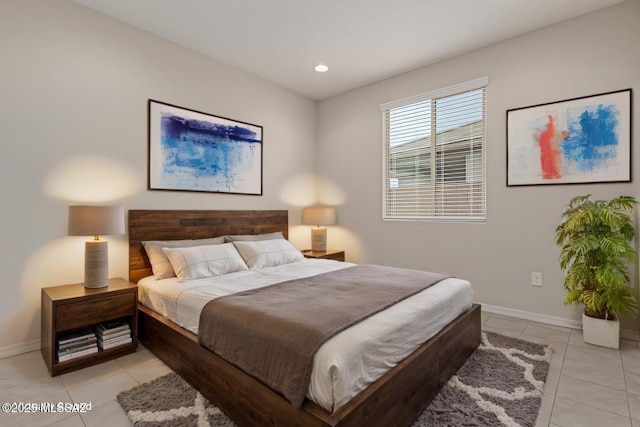 bedroom featuring recessed lighting, baseboards, and light tile patterned floors