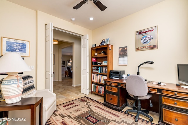 office space featuring a ceiling fan