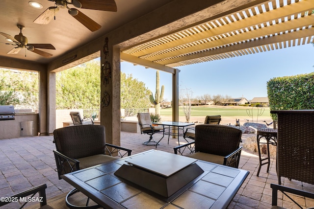 view of patio featuring area for grilling, grilling area, outdoor dining area, outdoor lounge area, and a pergola