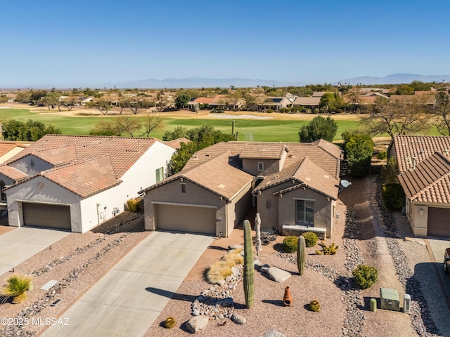 bird's eye view with view of golf course