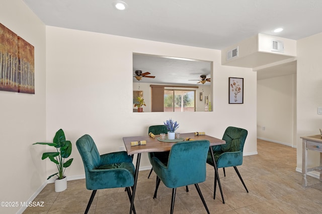 tiled dining area featuring baseboards, visible vents, and recessed lighting