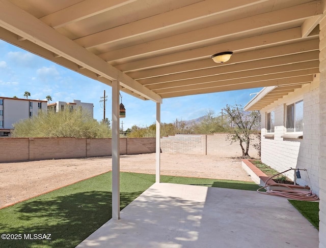 view of patio with a fenced backyard