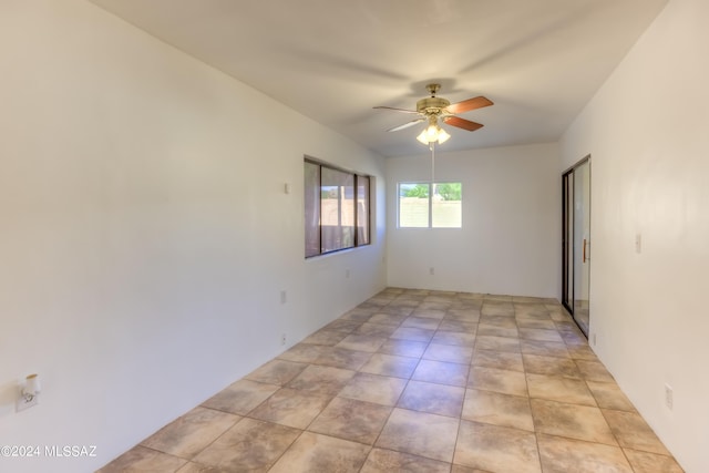 spare room featuring ceiling fan