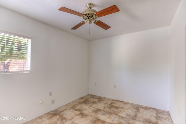 unfurnished room featuring a ceiling fan