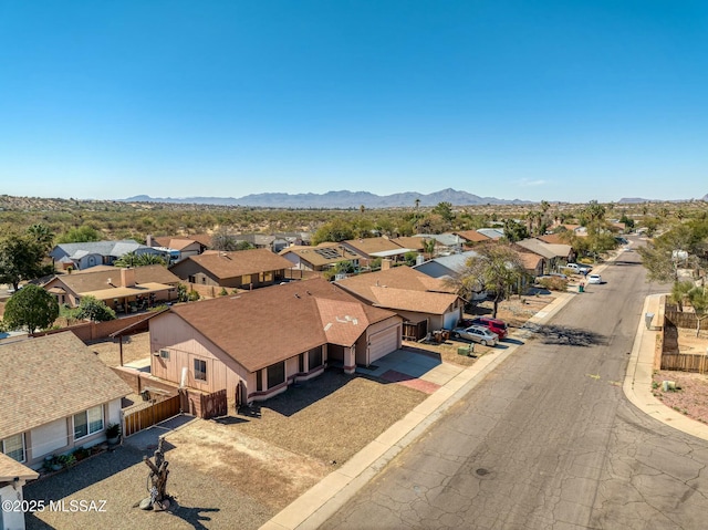 bird's eye view with a residential view and a mountain view