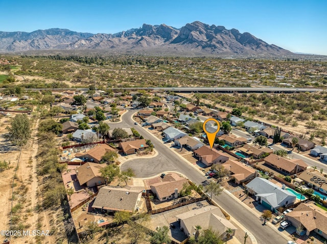 bird's eye view featuring a residential view and a mountain view